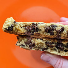 Load image into Gallery viewer, The inside of a top rated chocolate chip cookie waiting to be packaged in a cookie gift box.