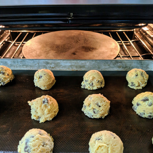 chocolate chip cookie dough headed to the oven