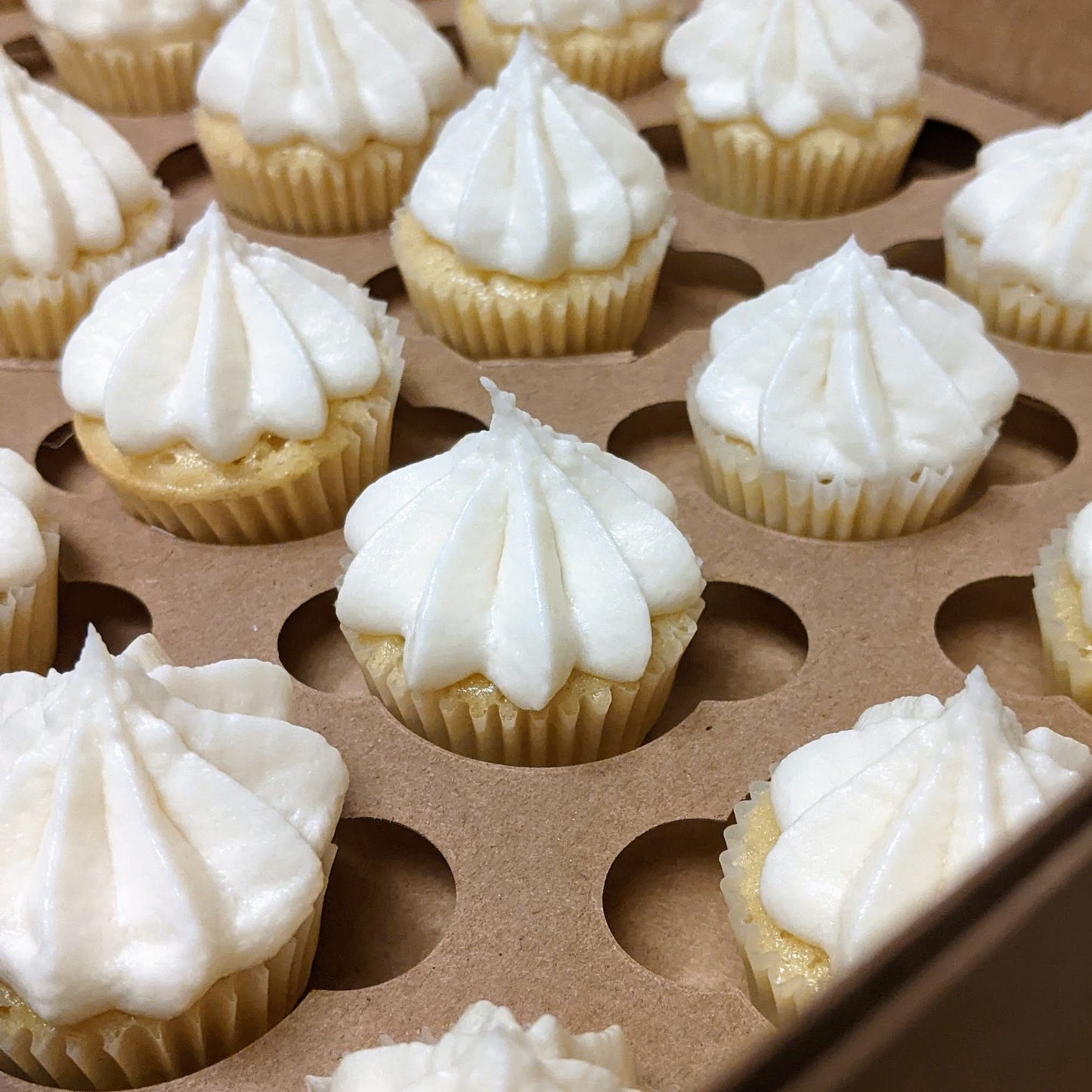 Lemon Cupcakes with Vanilla Buttercream Frosting / Week of March 2